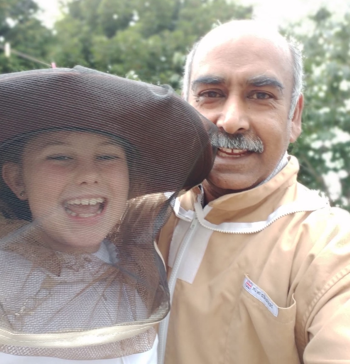 Beekeeper and her assistant